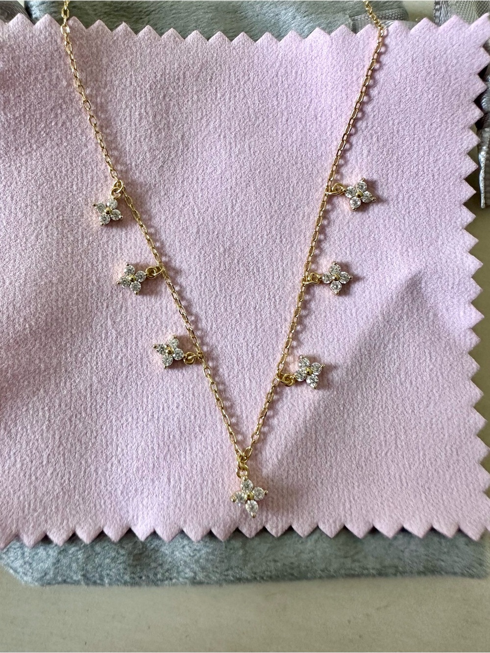 Petite clover charm necklace